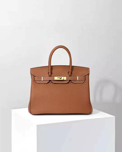 Angela Togo Leather Tote Padlock Bagq - Stellar Real