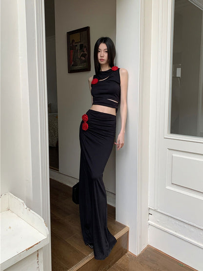 Irregular hollow vest + low waist long skirt two-piece Set